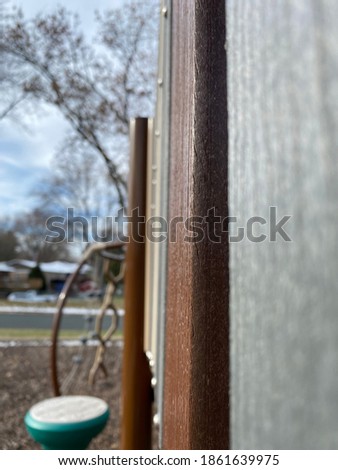 Close look of playground fence. 
