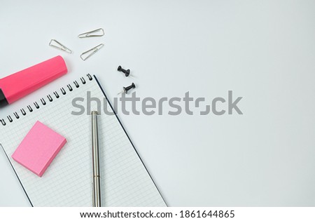 White background with work supplies. Top view with a space for text. High quality photo