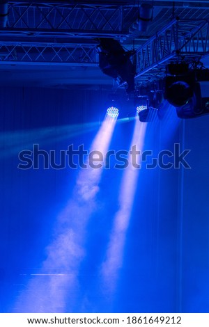 Spotlights and laser beams. Concert light. Stage lights. Soffits