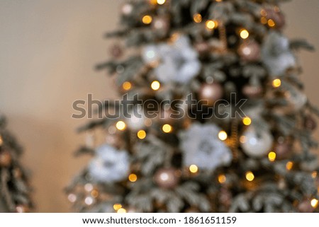 Decorated Christmas tree in blur, background for Christmas pictures. The concept of Christmas holidays, holidays. High quality photo