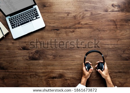 Aerial view of computer laptop on wooden table