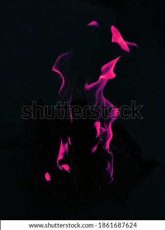 uttarakhand,india-3 may 2020:fire flames on air.burning wood in dark.this is a picture burning wood in dark.