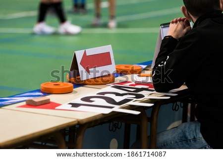 Table of the assistant of a basketball game, where they control personal fouls and game times.