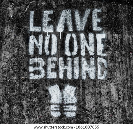 Leave no one behind graffito Royalty-Free Stock Photo #1861807855