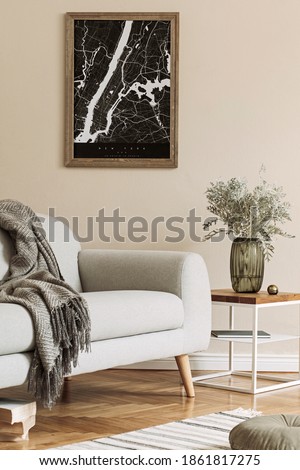 Design scandinavian home interior of living room with mock up poster map, stylish coffee table, gray sofa, plaid, pillow flower in vase and elegant personal accessories. Modern home staging. Template.