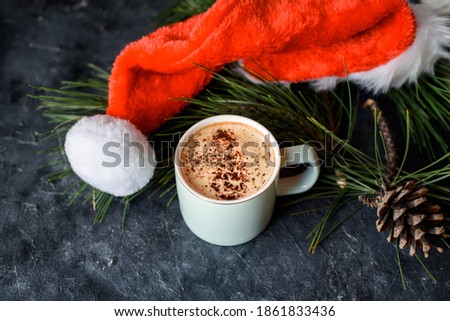 Delicious shortbread with pieces of chocolate in a small plate, aromate coffee, toys on the Christmas tree, sprigs of spruce, gifts, view from above. Flat lay