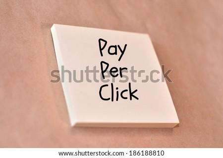 Text pay per click on the short note texture background 