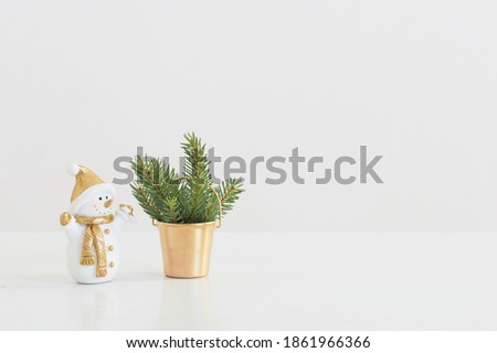 Christmas decorations with little ceramic snowman