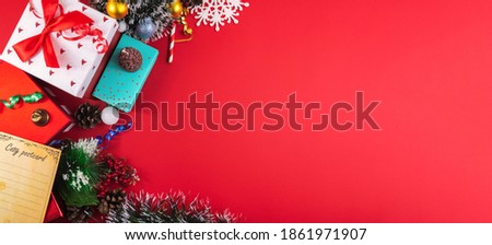 Bright christmas layout on a red background with copy space, top view