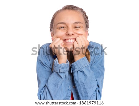 Happy teenage girl laughing looking very happy, isolated on white background