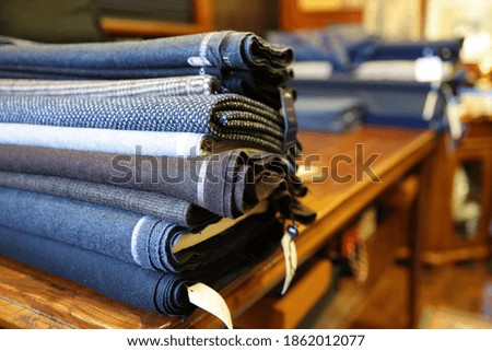 Fabric samples for men's clothing in a tailor's shop