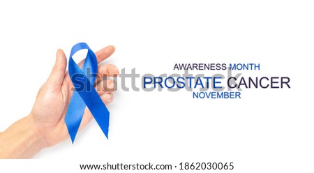Prostate awareness. Blue ribbon in hands isolated on white background. Awareness prostate cancer of men health in November. Healthcare, International men, Father day.
