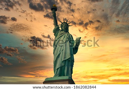 Statue of liberty with sunset