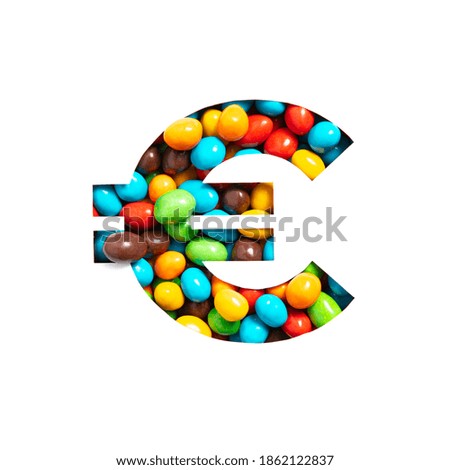 Euro currency sign of colourful candies and cut paper isolated on white. Typeface for festive design
