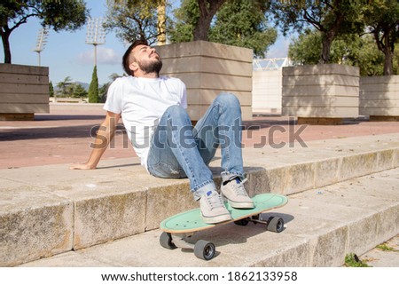 Skater with longboard in the park