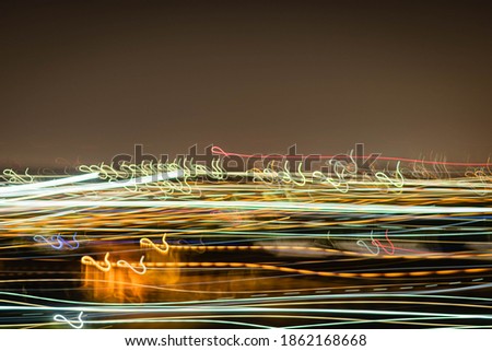 moving city lights at low shutter speed at night with great blur cordoba argentina