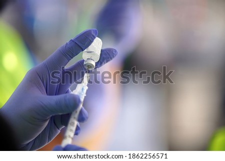                                healthcare workers getting ready to administer vaccines
