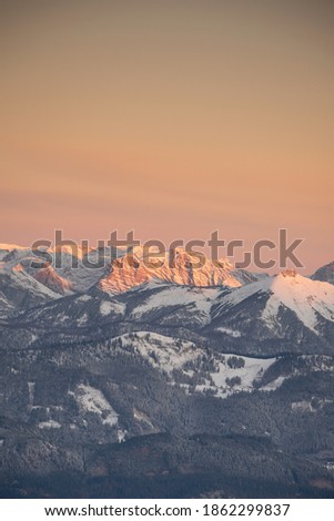 Austrian snowy mountains before sunrise