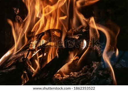 Fire burning in a fireplace, abstract background