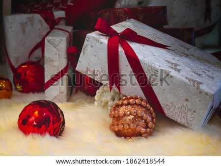 Christmas background and New Year background with gift boxes. Preparation for holidays. Top view with copy space.
