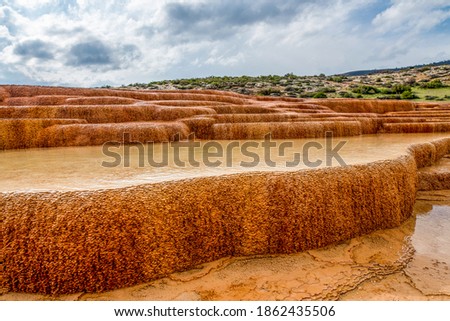 Badab Soort is a natural site in Mazandaran Province in northern Iran,south of the city of Sari.It comprises a range of stepped travertine  formations that has been created over thousands of years .