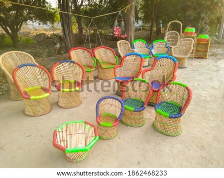 A picture of wood chairs with selective focus