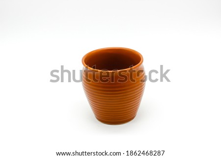 A picture of soil tea cup isolated on white background