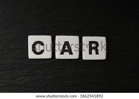 car word on cardboard paper blocks, directly above view