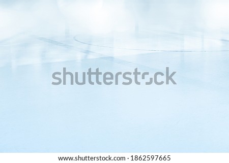 COLD LIGHT BACKGROUND, ICE HOCKEY STADIUM FIELD WITH SCRATCHED ICY FLOOR AND EMPTY SPACE FOR MONTAGE