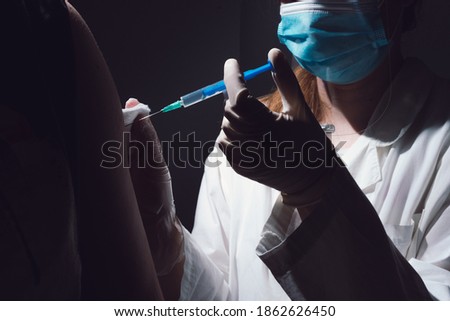 People getting covid-19 vaccine close up Royalty-Free Stock Photo #1862626450
