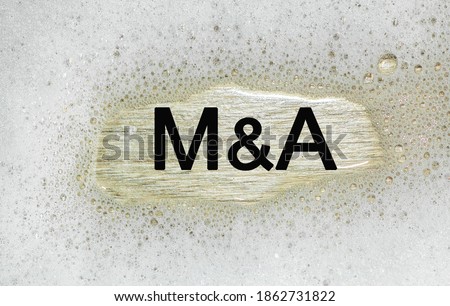text M and A in the background. creates a great background for your concept .