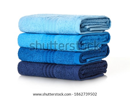 Clean towels stack on white background Royalty-Free Stock Photo #1862739502