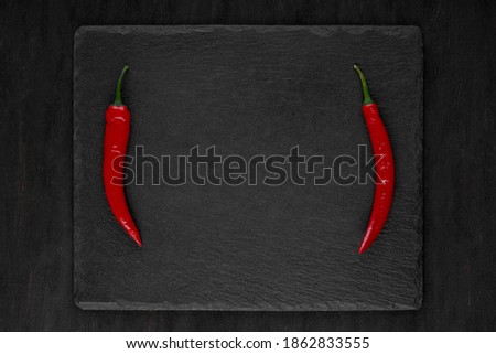 background of fresh red chili in rectangular shape for love of chili flavor, top view.