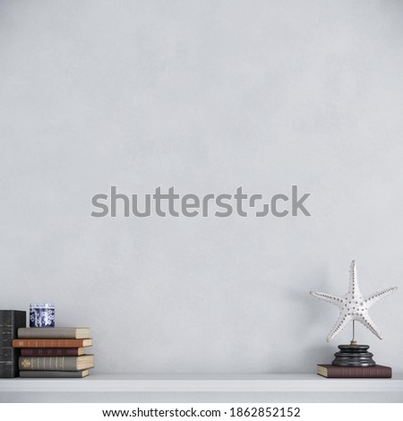 Books, decorative accessories on white desk, shelf with white background