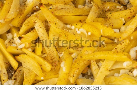 Delicious potatoes with some sprinkled spice. recently cooked hot
