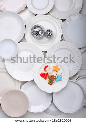 Tasty Homemade Decorated Christmas Sugar Cookies on White Plate. Top View with Copy Space