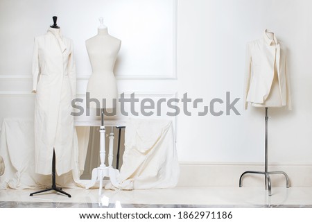 Tailor's textile mannequin in clothes designer show room Royalty-Free Stock Photo #1862971186