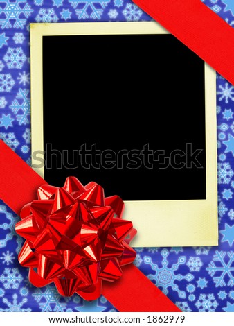 Happy Returns: Christmas. (Aged instant photo And Gift Ribbon Over Snowflakes Background. (With clipping path for easy framing your picture))