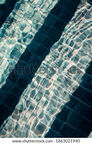 
Light reflections from the pool