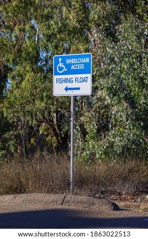 A Wheelchair Access Fishing Float Sign.