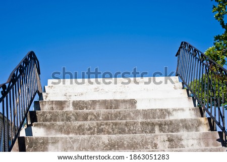 Staircase or steps. Porch or stoop photographed outside.