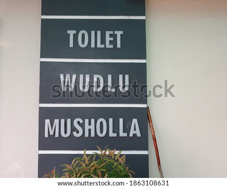 Writing signs indicate wudlu, toilet and musholla