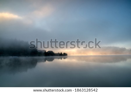 Foggy morning at a lake