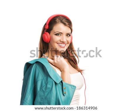Attractive girl with headphones on white background