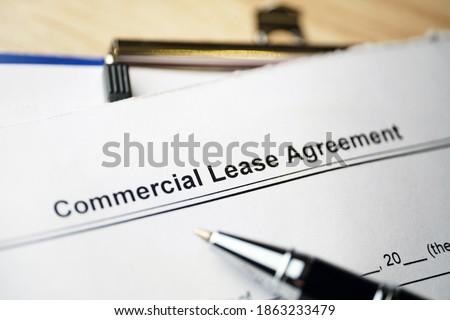 Legal document Commercial Lease Agreement on paper. Royalty-Free Stock Photo #1863233479