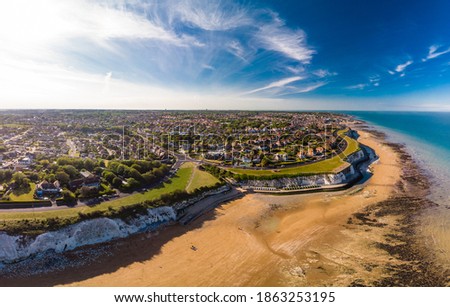 Drone aerial view of the beach and white cliffs on sunny day, Margate, England, UK Royalty-Free Stock Photo #1863253195
