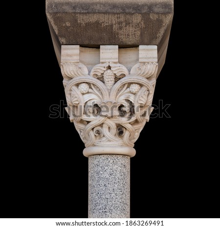 Elements of architectural decorations of buildings, columns and capitals, gypsum moldings, wall textures and patterns. On the streets in Barcelona, public places.