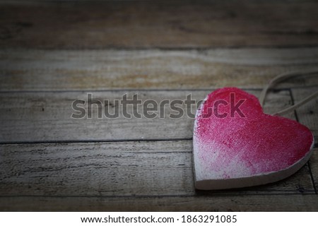 Valentines Day backround. Selective focus is on a heart only. Bokeh effect.
