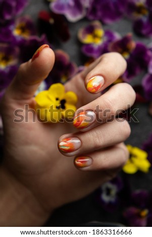 Hand of the woman with flowers	