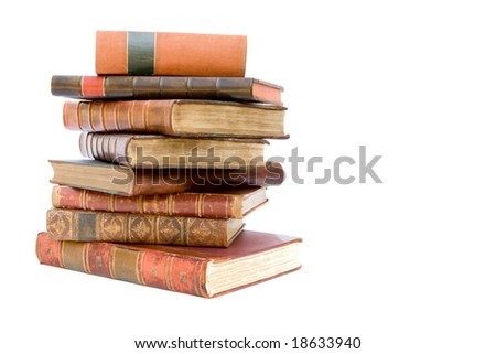 Pile of old leather bound books isolated on a white background